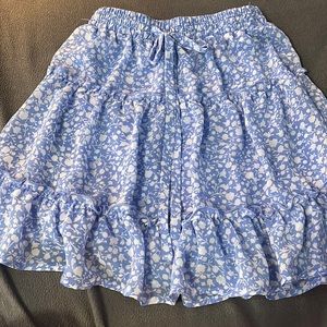 Blue flowery skirt with a bow on the front!